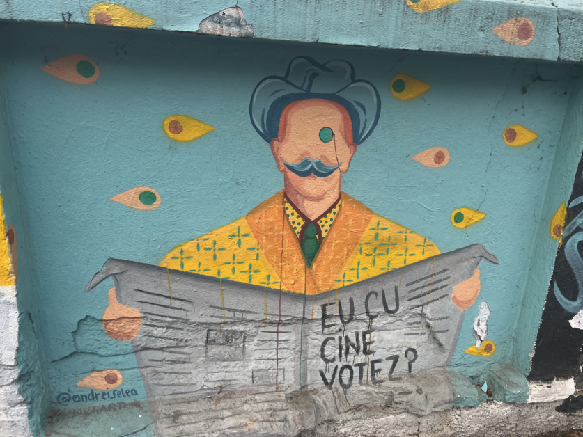 Caragiale graffiti asking "With whom do I vote?"