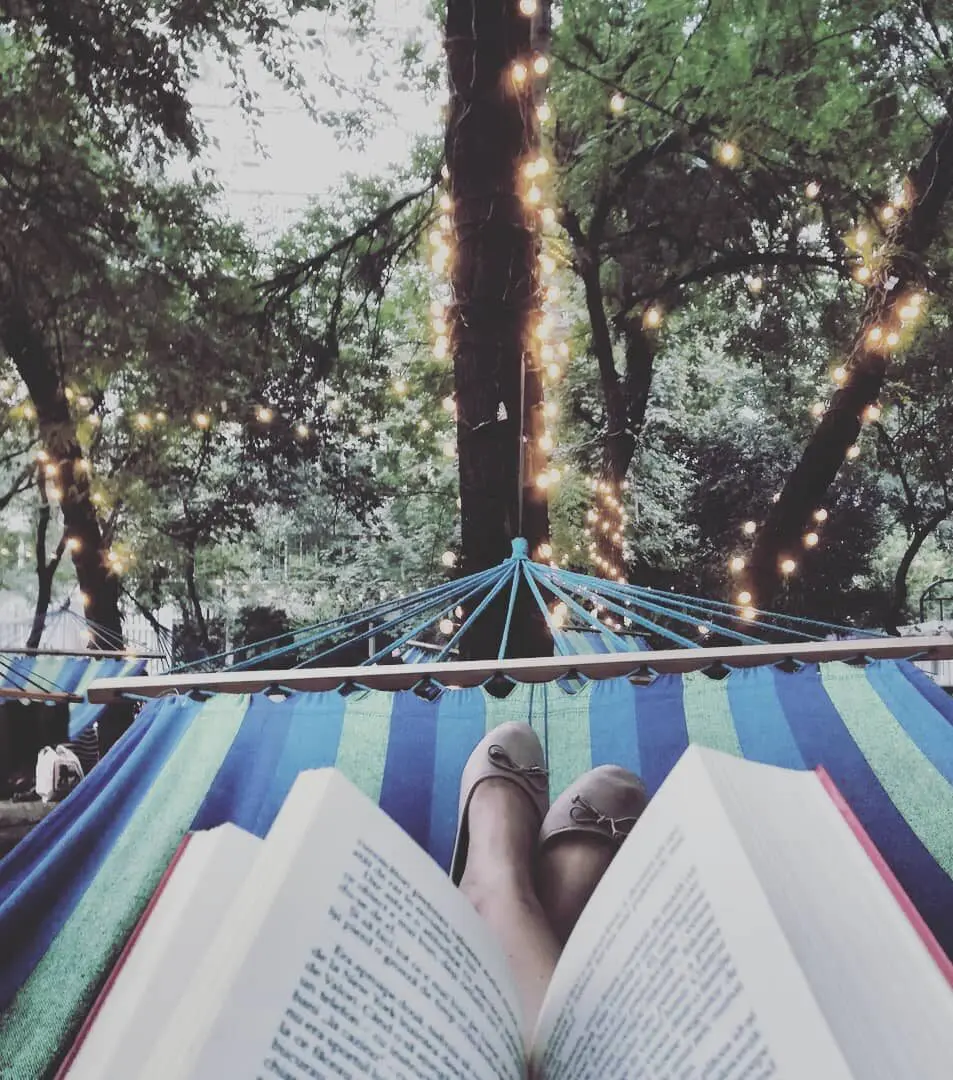 reading on a tree